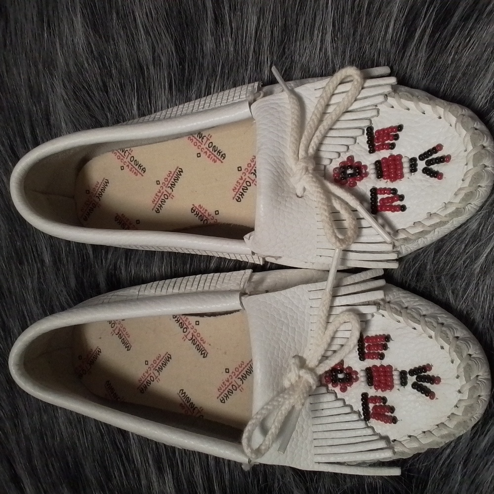 Minnetonka Thunderbird soft sole slip ons